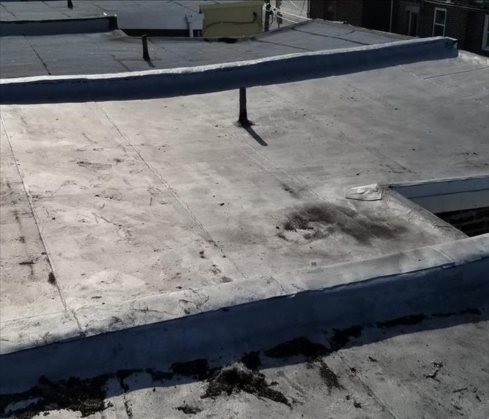 Roof of building that leaks when it rains
