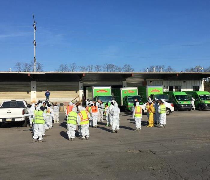 SERVPRO team in PPE preparing do a cleaning job