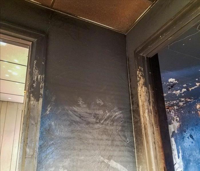 Smoke and soot damage in the bedroom of a Delaware County home